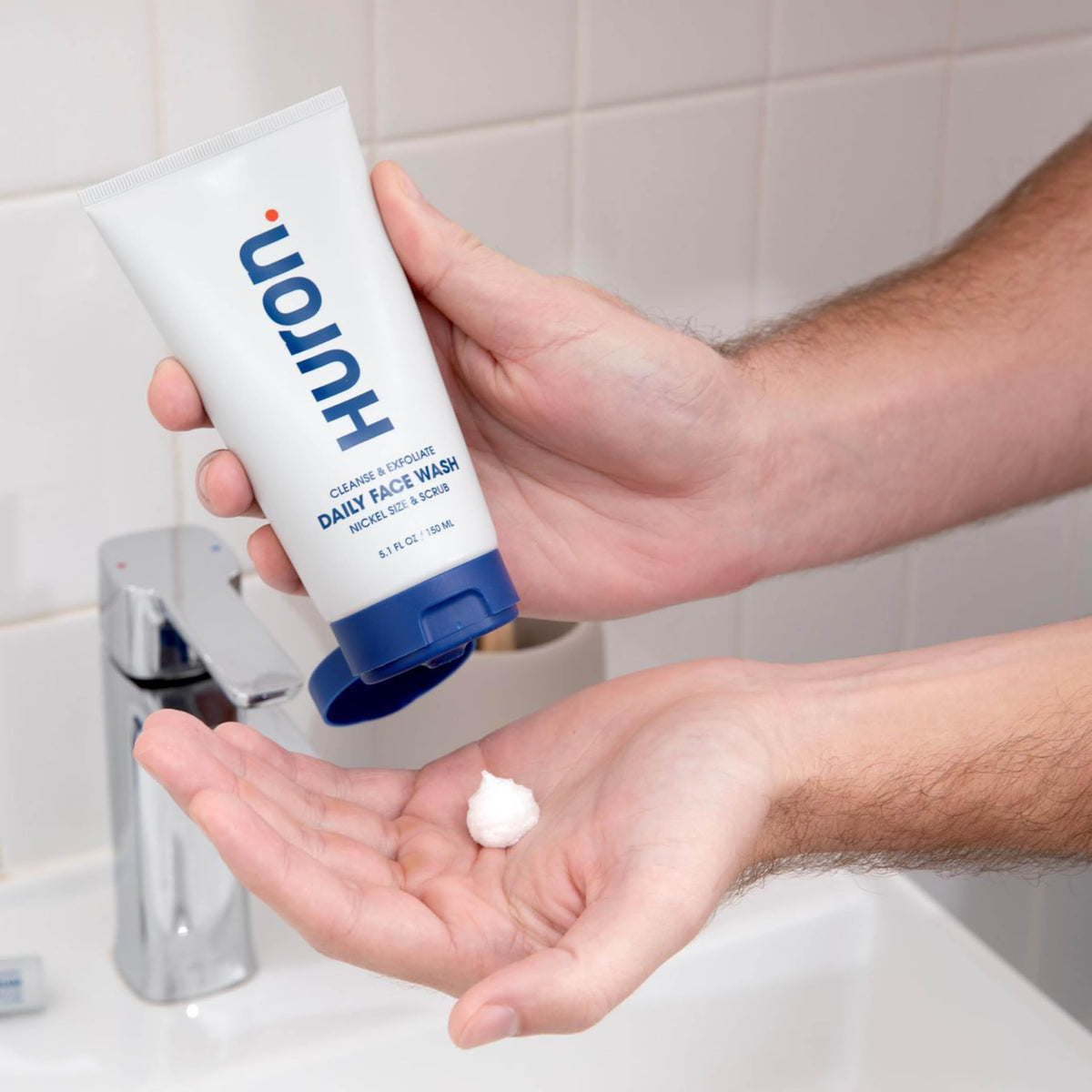 Huron Men’s Face Wash packaging indicating cruelty-free and recyclable materials.