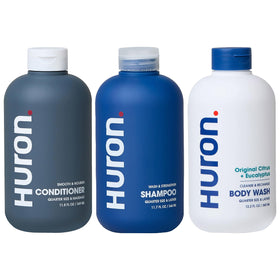 Huron Shower Kit 3-piece set displayed on sink for convenient daily cleansing