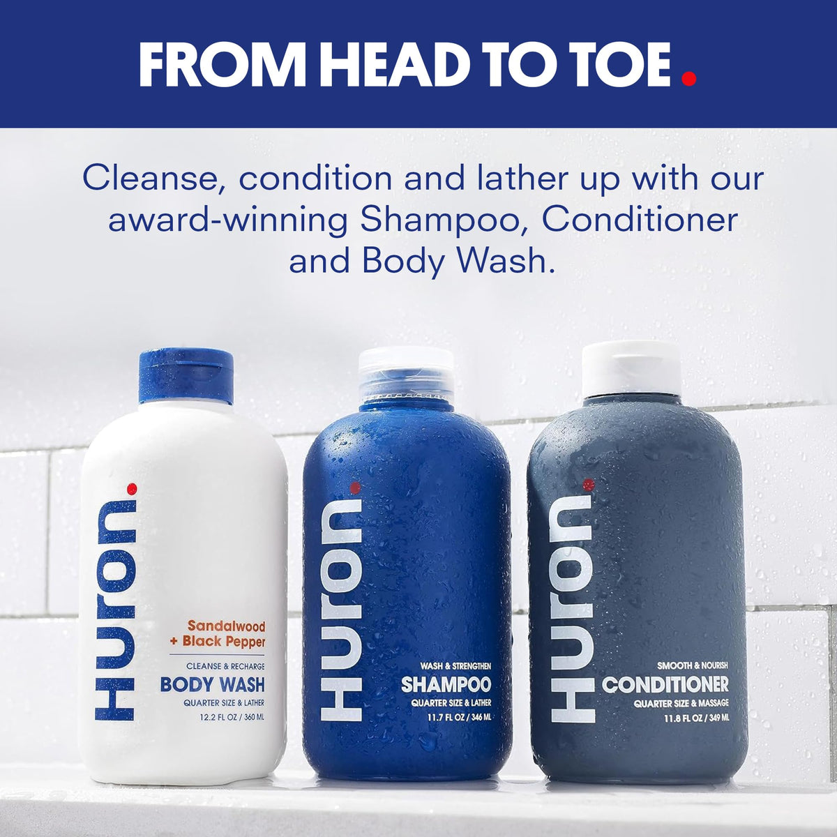 Huron Shower Kit shampoo bottle close-up highlighting cleansing formula for refreshed hair.