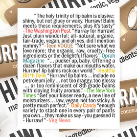 Travel-friendly Hurraw! Coconut Lip Balm pack in carry-on bag.
