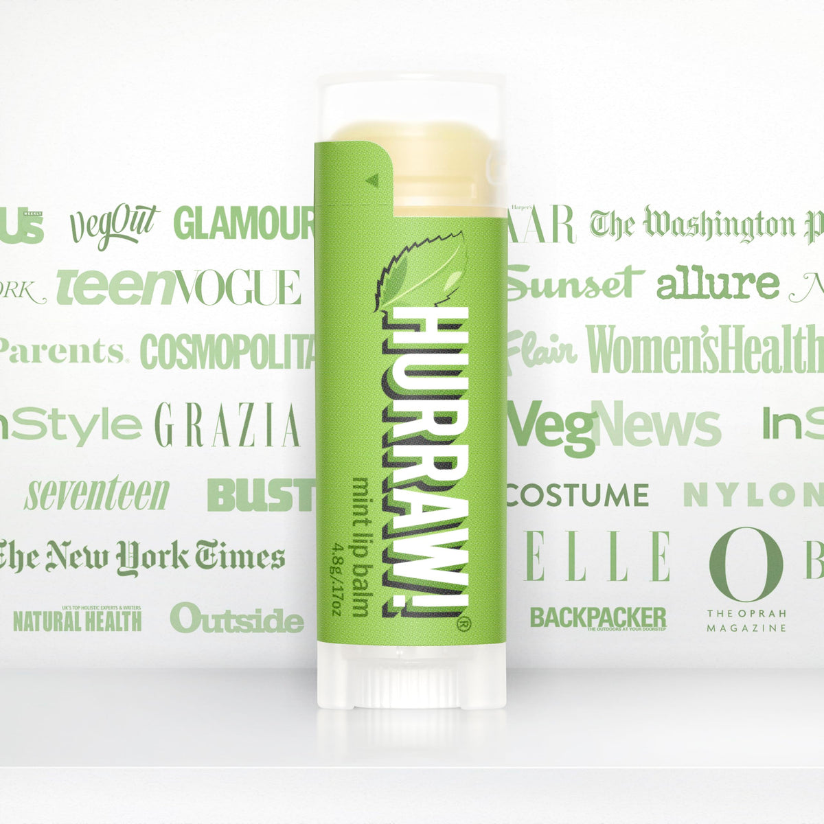 Hurraw! Mint lip balm tube open application moment shows easy use