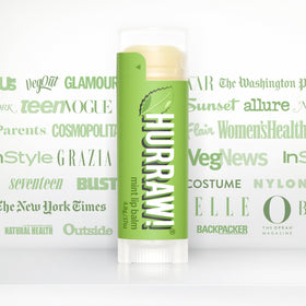 Hurraw! Mint lip balm tube open application moment shows easy use