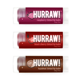 Hurraw! Raspberry tinted lip balm packaging shows a 3-pack for on-the-go color.