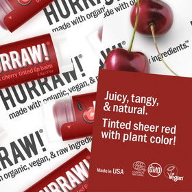 Hurraw! Raspberry tinted lip balm swatch shows sheer berry tint and fresh fragrance.