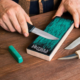 Hutsuls buffalo leather strop detail shows premium material for gentle edge refinement.