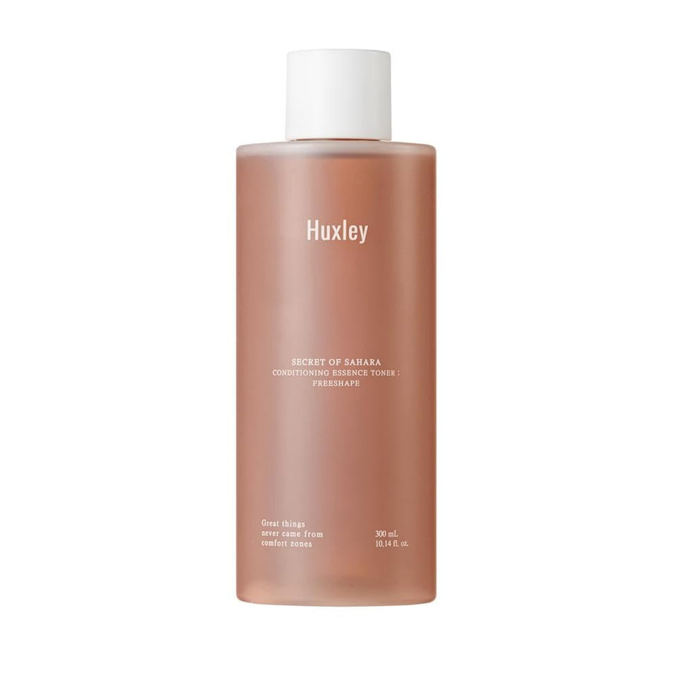 Huxley Secret of Sahara conditioning toner bottle pouring for instant hydration and dewy skin.