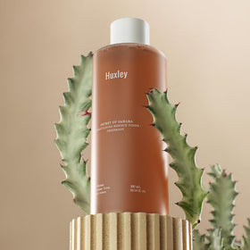 Close-up of viscous texture showing makeup-ready glow from the essence toner.