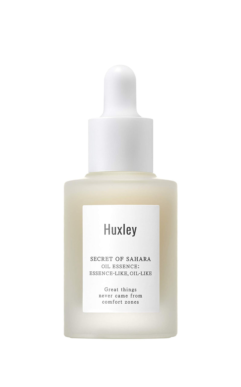 Huxley Secret of Sahara Oil Essence bottle closeup showing sleek packaging and easy daily use.