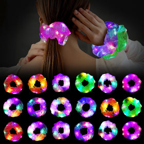 Hwahong 18-piece glow scrunchies glow in the dark for night styling.