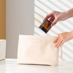 HXARTMIS leak-proof lid ensures secure transport for travel-sized cosmetics