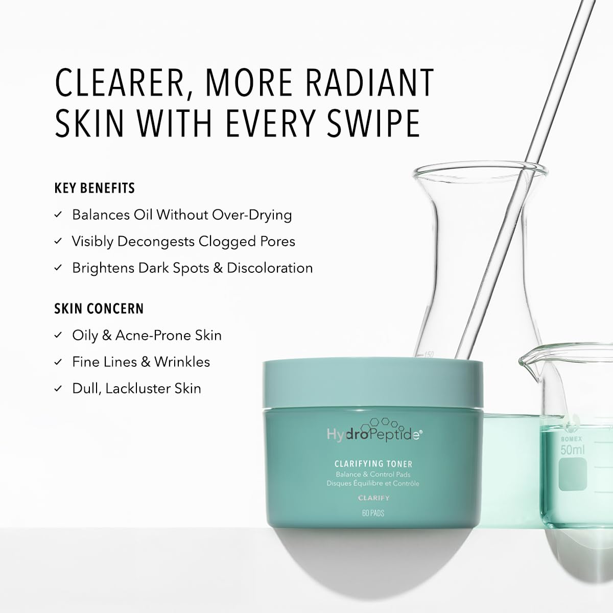 HydroPeptide Clarifying Toner Pads pads on hand close-up for gentle exfoliation and toning.