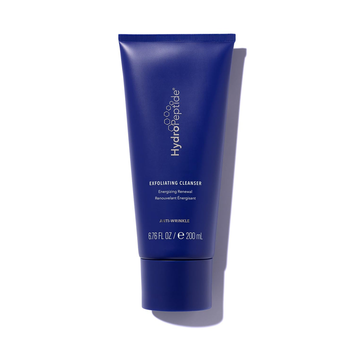 HydroPeptide Exfoliating Cleanser bottle pour shows rich lather for gentle renewal.