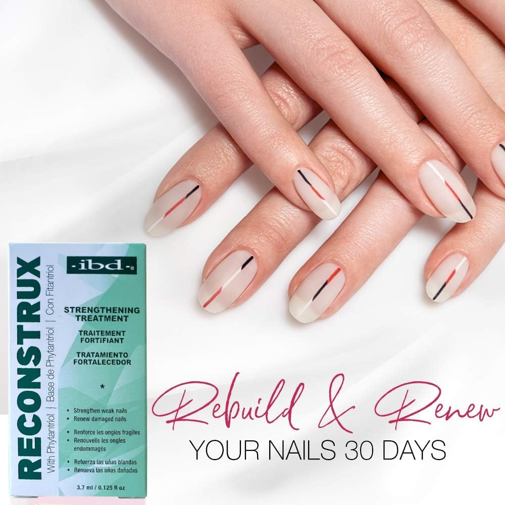 Close-up of the Reconstrux nail growth brush applying on nails.