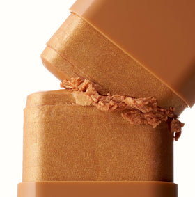 Iconic London Glow All Over Melting Balm Stick texture glides smoothly for easy touch-ups.