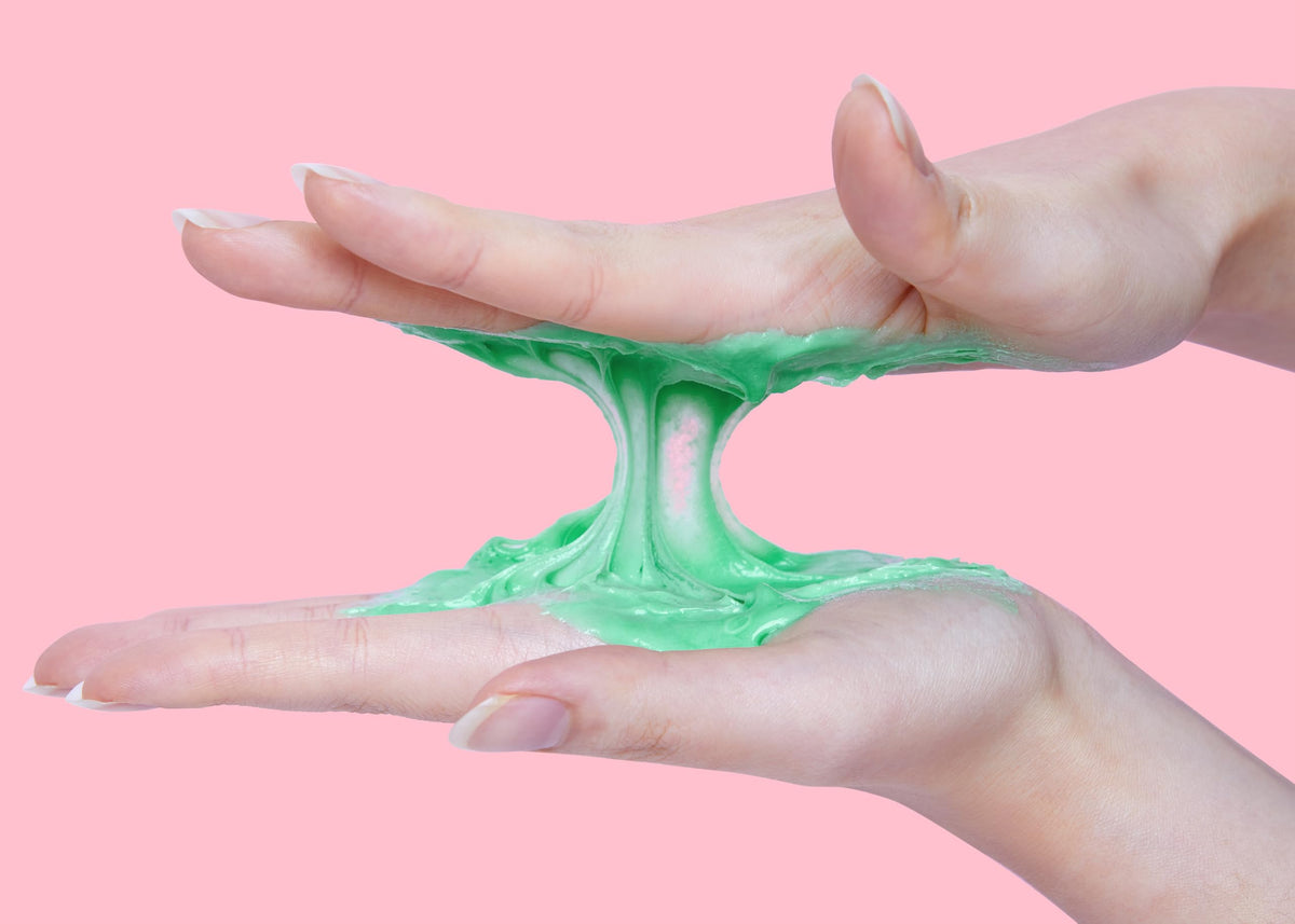 Product shot of Namaste Kitten cleansing solution with playful branding.