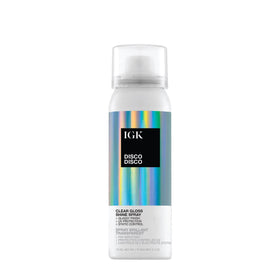 IGK Disco Disco travel size bottle showing glassy shine on the go