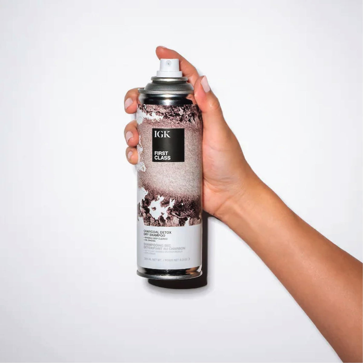 IGK First Class Charcoal Detox Dry Shampoo travel-friendly TSA-approved packaging.