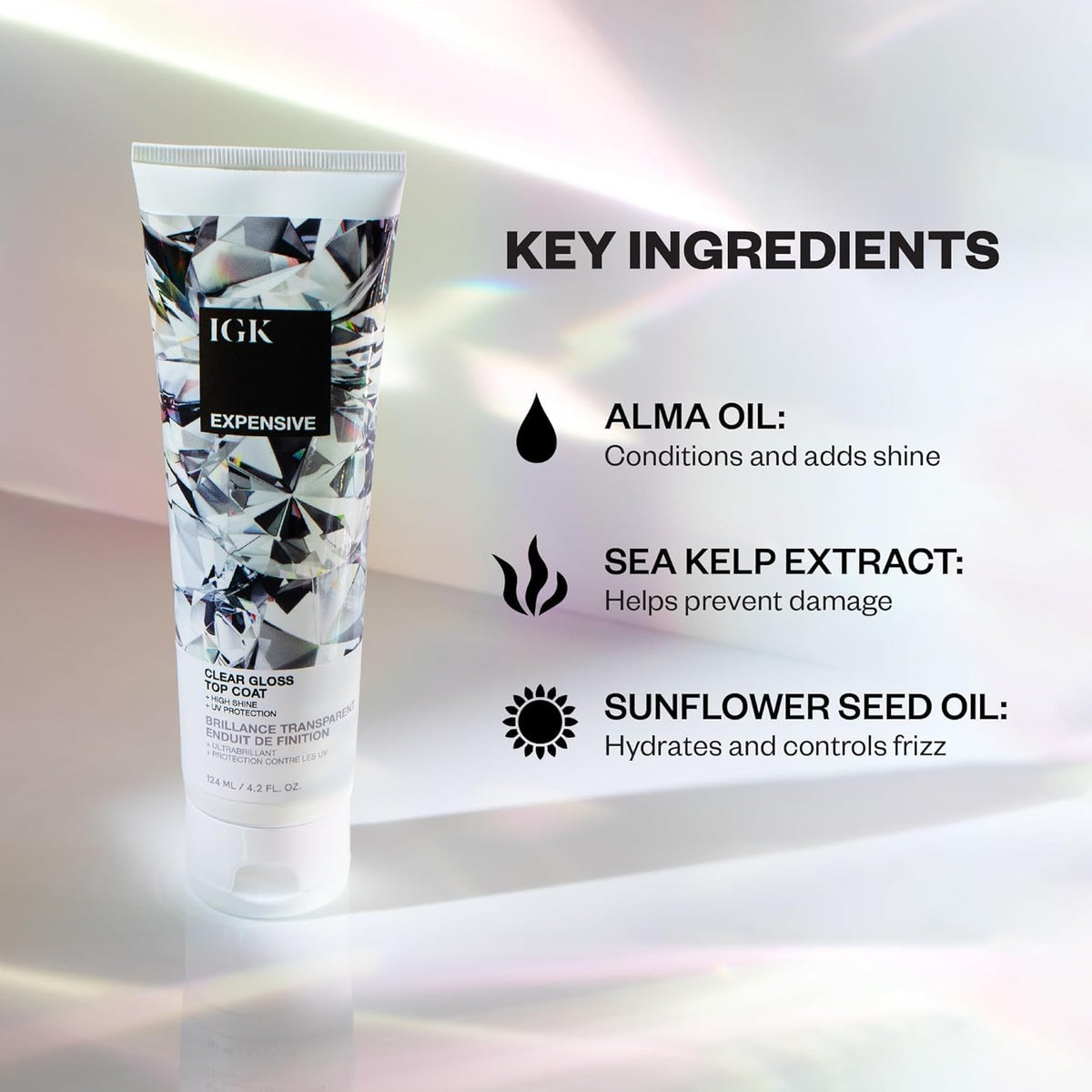 Close-up of IGK Expensive Clear Gloss Top Coat label emphasizing vegan, cruelty-free formula.