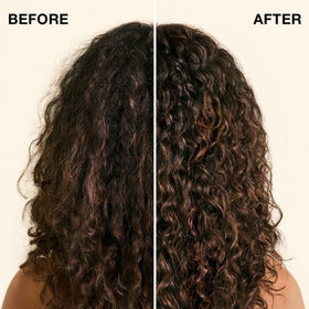 IGK Good Behavior mask cream texture during application for detangling.