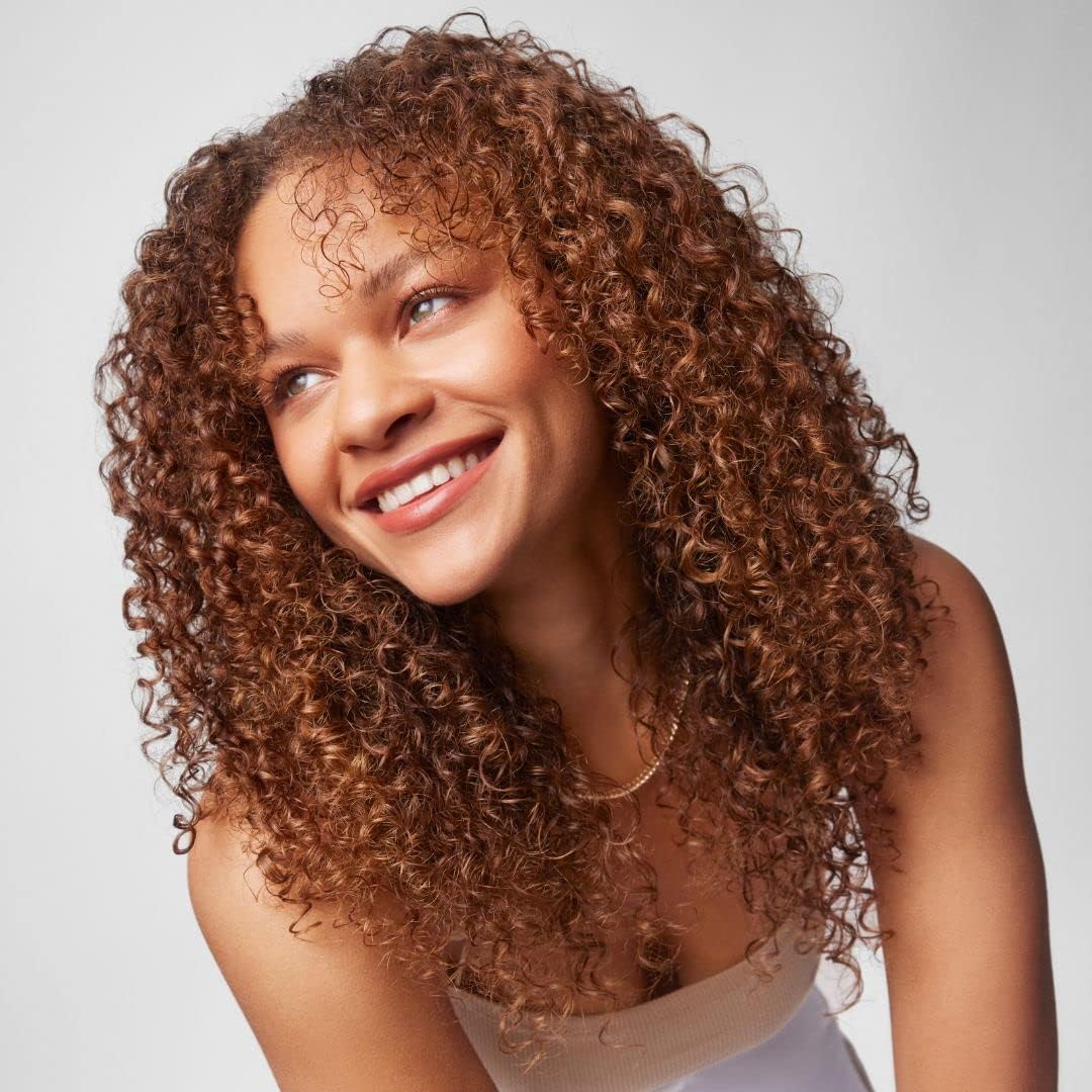 IGK Good Spin after-use hair with subtle shine and frizz-free finish.