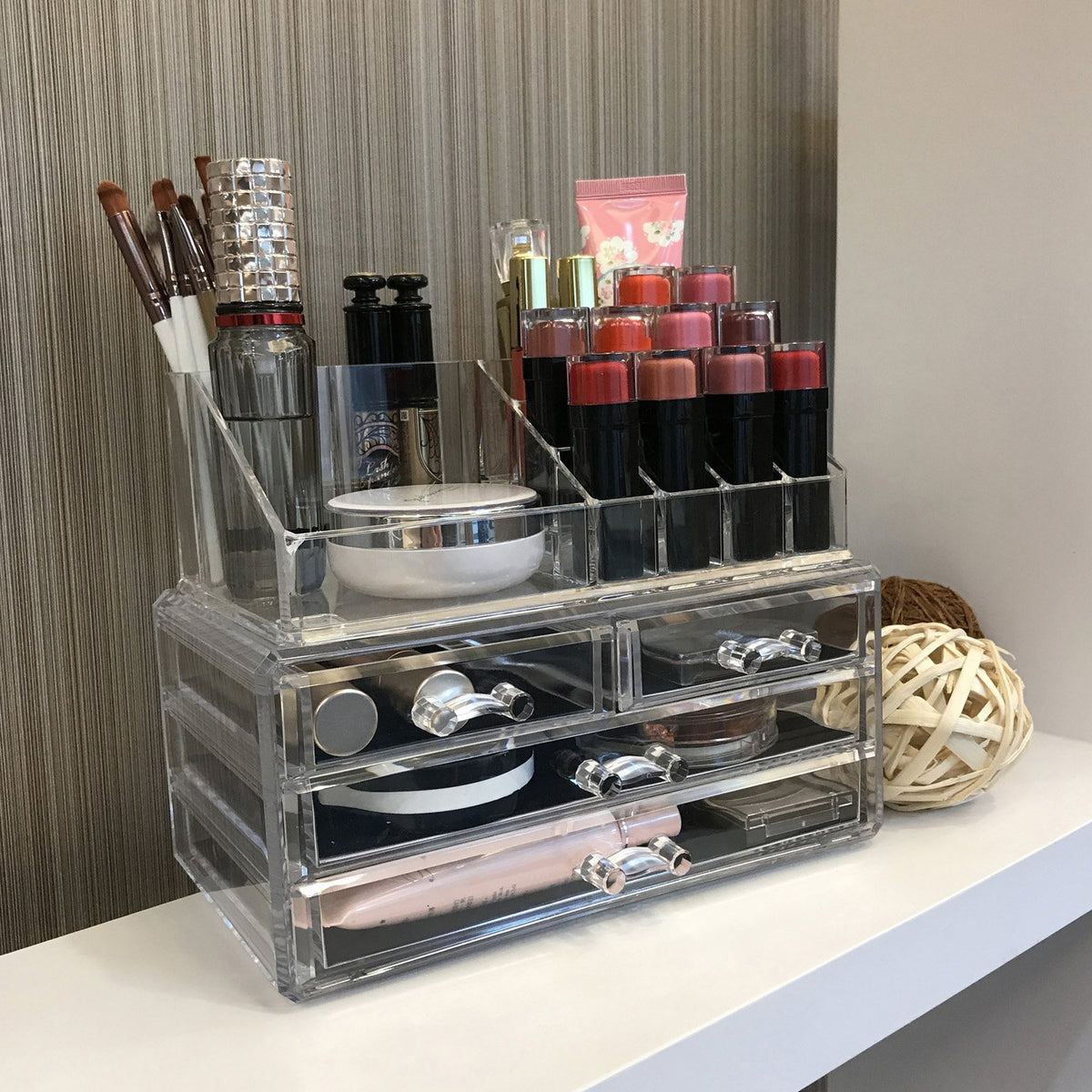 Ikee Design clear acrylic material delivers sturdy, durable vanity storage.