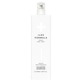 ILES FORMULA Haute Performance Shampoo bottle demonstrates gentle cleansing for all hair types.