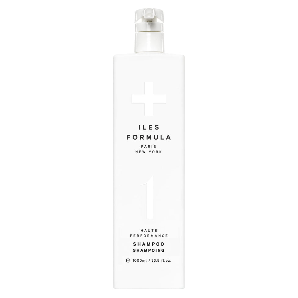 ILES FORMULA Haute Performance Shampoo bottle demonstrates gentle cleansing for all hair types.