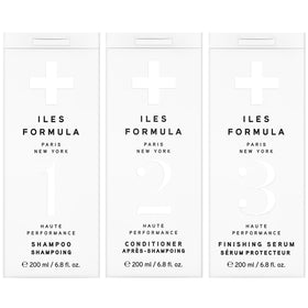 ILES FORMULA Signature Deep Repair Shampoo bottle — smoother, stronger hair from the first use.