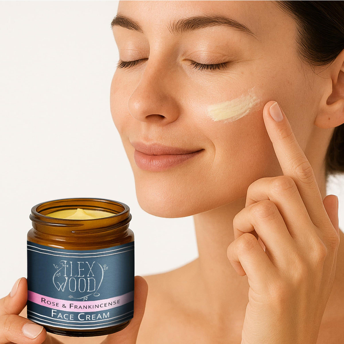 Applying The Ilex Wood Rose and Frankincense cream as part of a routine.