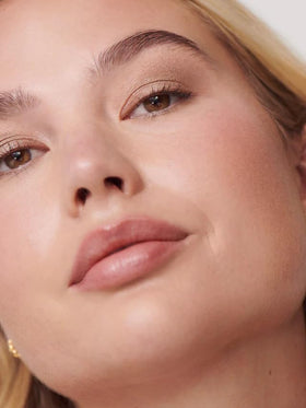 ILIA Chromatic Liquid Powder Eye Tint Fresco wand close-up showing cushiony glide