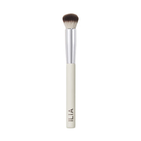ILIA Complexion Brush with wood handle for precise, even application.