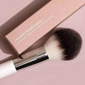 ILIA Finishing Powder Brush domed head designed to buff powders evenly