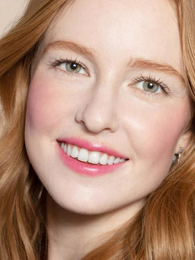 ILIA Multi-Stick Berry shade glow on lips and cheeks