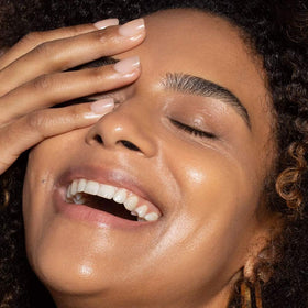 ILIA packaging flatlay emphasizes vegan skincare makeup convenience in one step