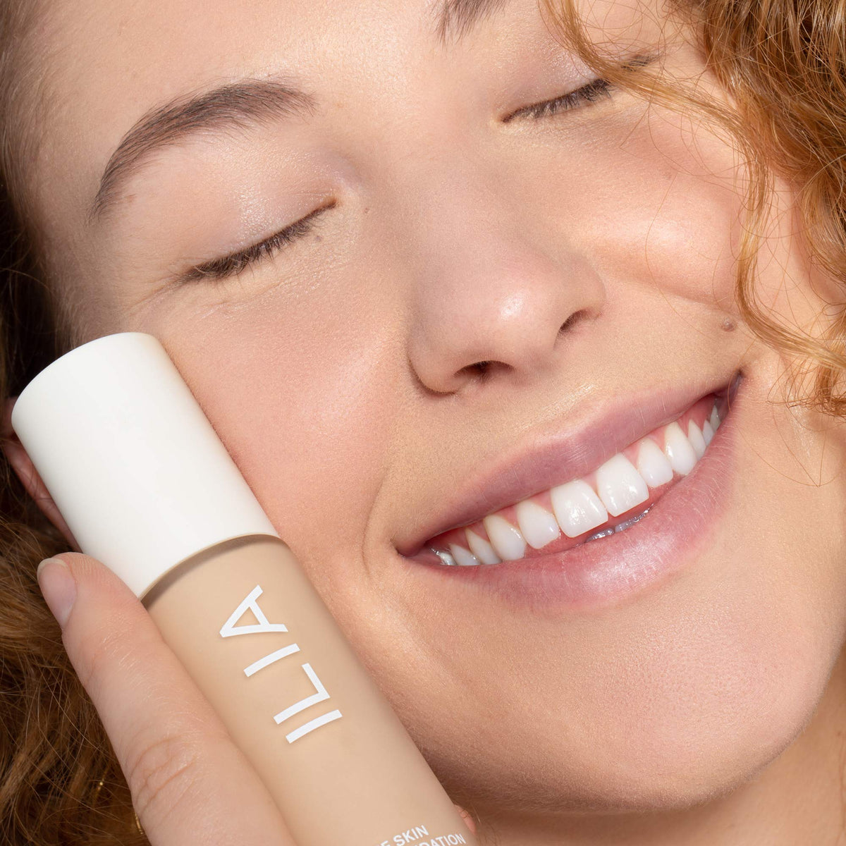 ILIA swatch on arm reveals natural finish and even tone