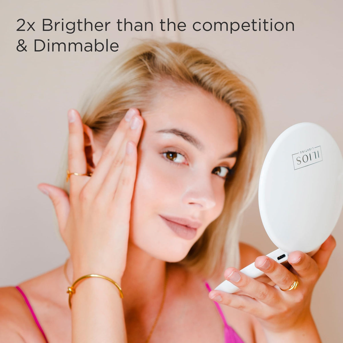 Ilios Lighting TSA-friendly compact mirror with snap-close cover protects the surface.
