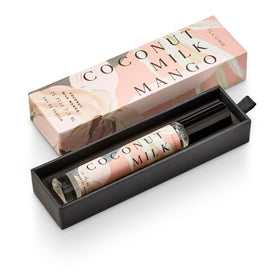 Illume Coconut Milk Mango perfume bottle on vanity for daily refresh