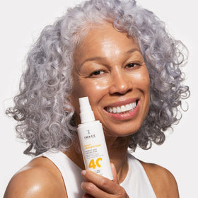 IMAGE Skincare Daily Prevention Protect & Refresh Mist closeup of bottle and lightweight texture