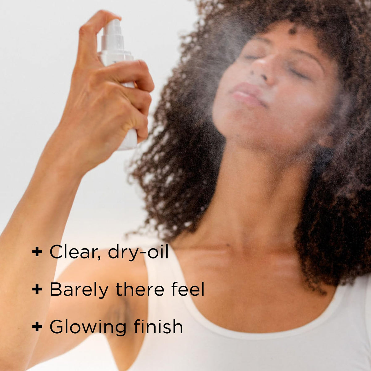 IMAGE Skincare Daily Prevention Protect & Refresh Mist spray-action captured for quick reapplication