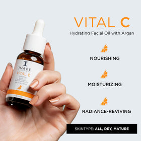 Close-up of Vital C oil in amber bottle ready to apply