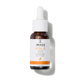 IMAGE Skincare Vital C Hydrating Facial Oil bottle pouring for easy application