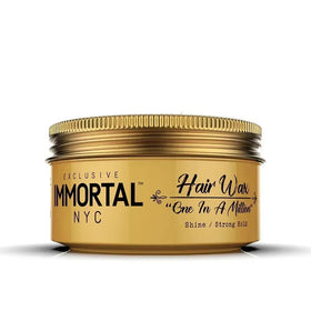 Immortal NYC One In A Million Hair Wax hands applying for easy styling