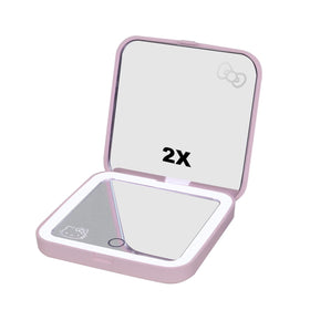 Hello Kitty mirror with 2x magnification for detail makeup checks.