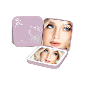 Impressions Vanity Hello Kitty compact mirror top with LED lighting for even illumination.