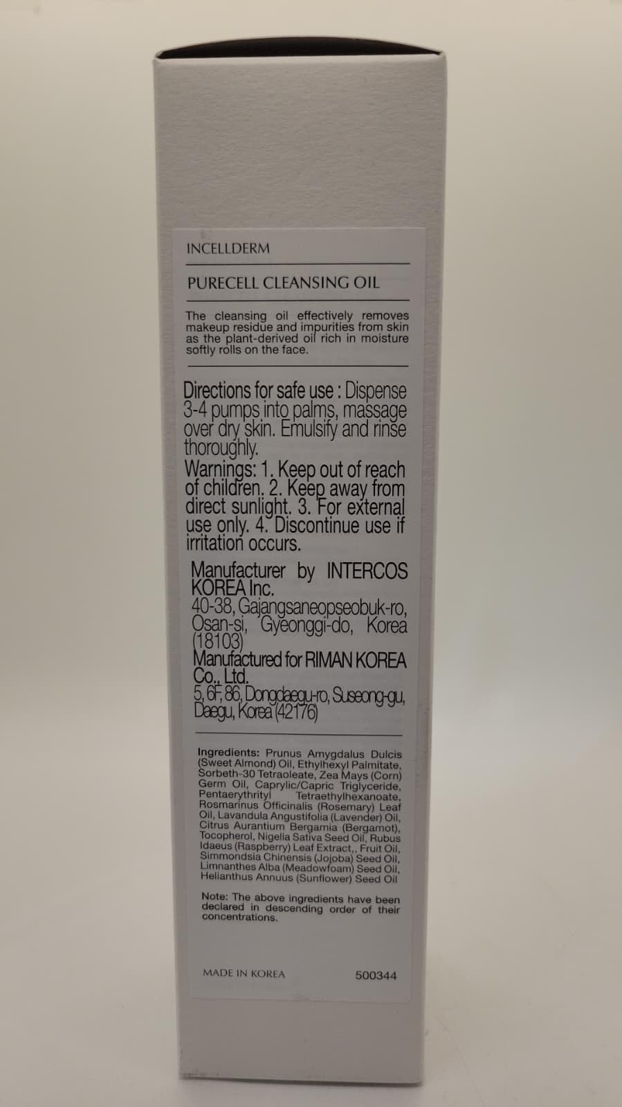 INCELLDERM PureCell Cleansing Oil bottle beside a fresh towel for daily cleanse