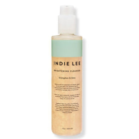 Indie Lee Brightening Facial Cleanser bottle close-up with strawberry scent for refreshing daily care