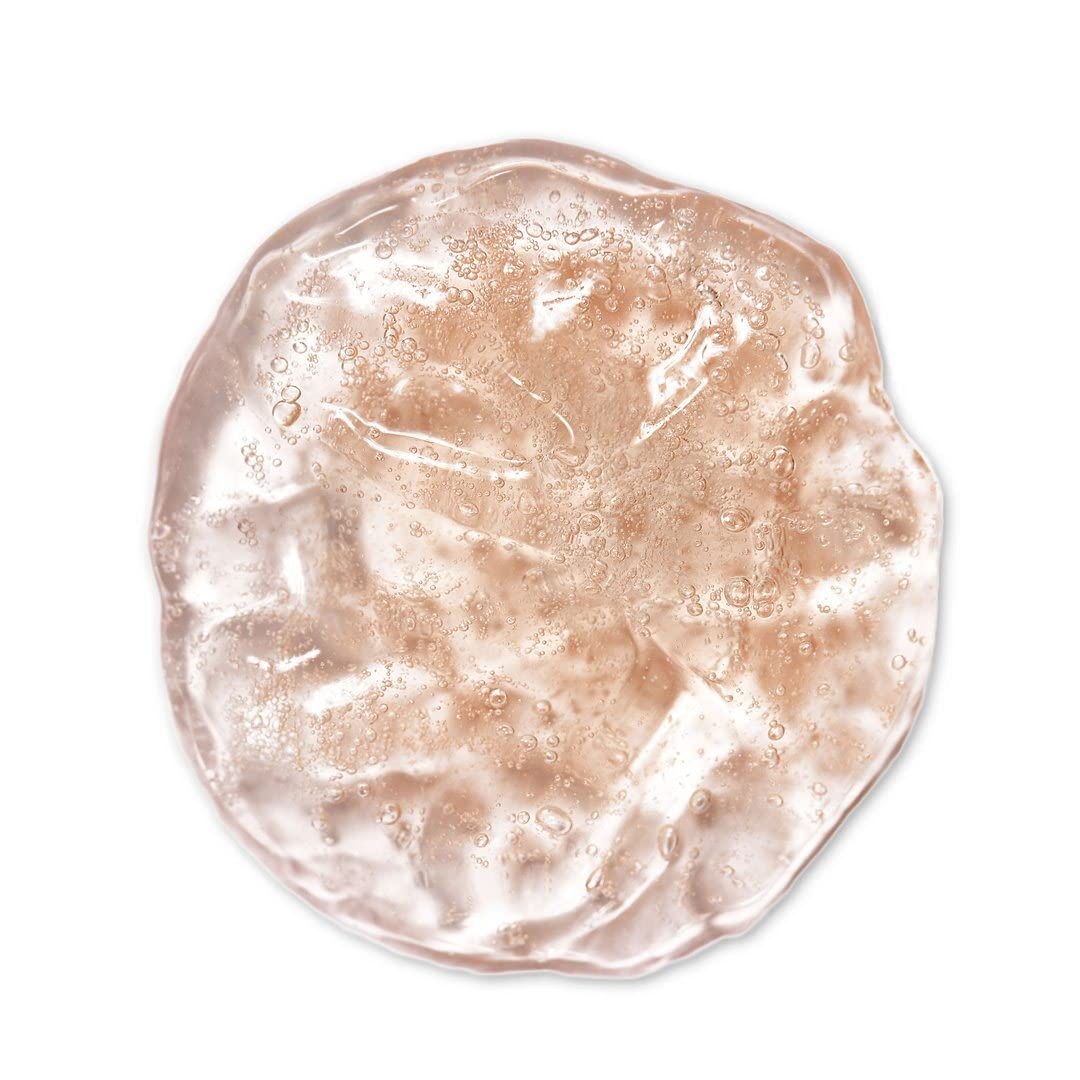 Indie Lee Brightening Cleanser being massaged on the face for hydration