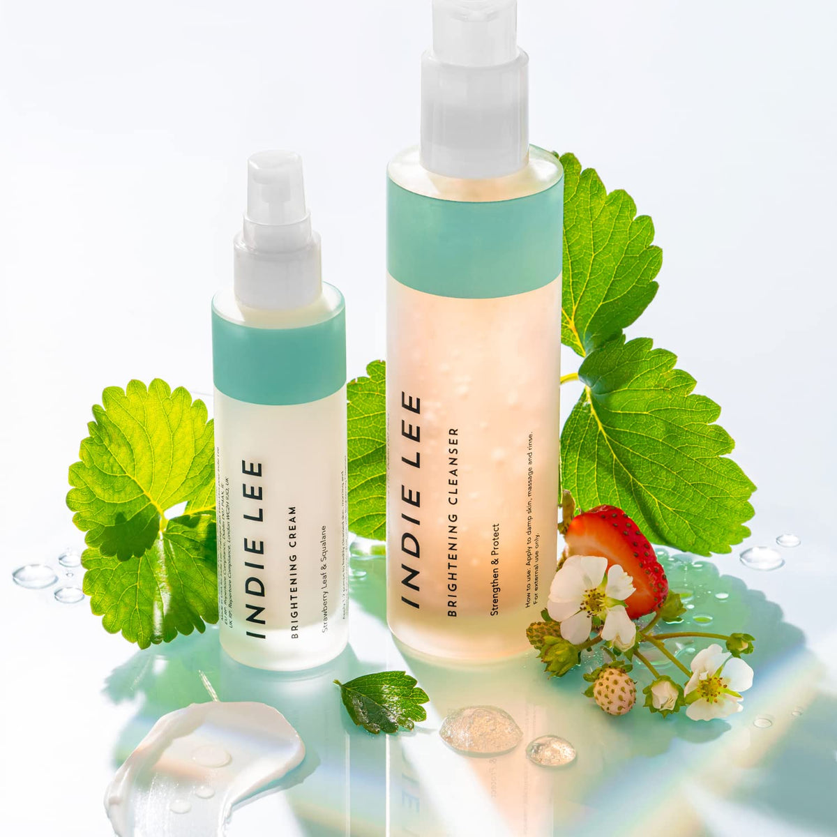 Indie Lee Brightening Cream strawberry leaf extract visual focus for radiant glow.