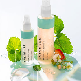 Indie Lee Brightening Cream strawberry leaf extract visual focus for radiant glow.