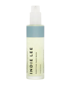 Indie Lee Purifying Face Wash bottle pour for daily cleansing and makeup removal.